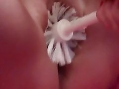 Bizarre toilet brush fucked and fisted amateur