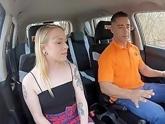 Inked blonde fucks with her driving instructor
