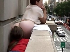 Big booty lesbian teen gets her holes devoured on a balcony