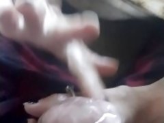 Wife takes care of morning wood with handjob and sucks cum