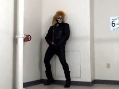 masked leather man quickly shoots his load in hotel stairway
