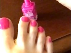 Teen paints toenails part 2