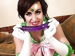 Masturbating costume babe with a toy up her ass