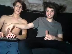 Two beautiful young guys masturbate together on the webcam