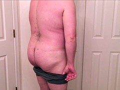 chubby guy strips down